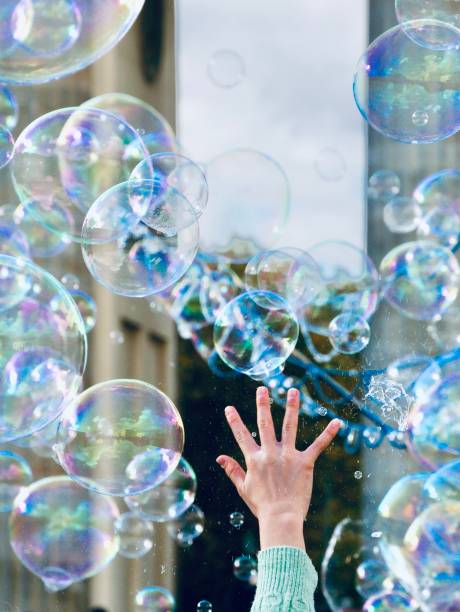 istock Hand popping bubbles at Brandenburg Gate 1436164764