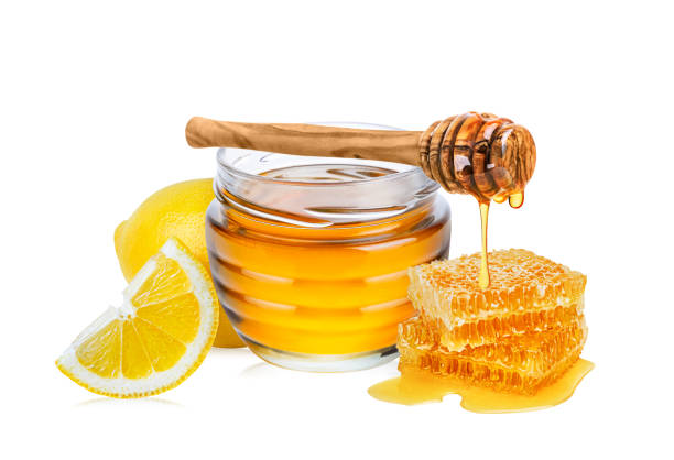 istock Lemon and honey isolated on white background. 1436165305
