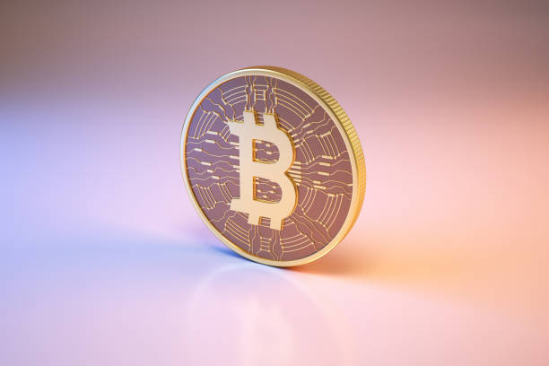istock Bitcoin digital currency sitting on metallic blue and pink background 1436167184