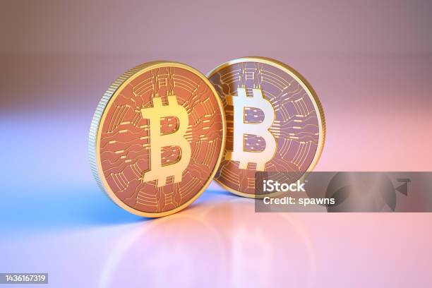 Bitcoin Digital Currency Sitting On Metallic Blue And Pink Background Stock Photo - Download Image Now