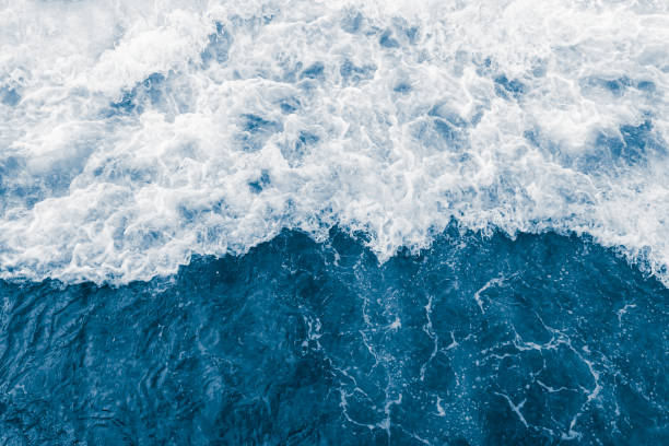 istock Dark blue sea ocean large wave and  liquid white foam 1436170513