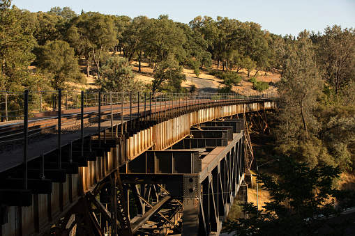 Sunset view of the historic train trestle of downtown Auburn, California, USA.
