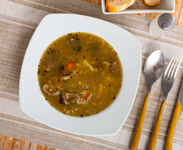 istock Soup with forest mushroom, pork meat and vegetables 1436172651