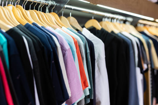 istock Male shirts on hangers in store 1436172669