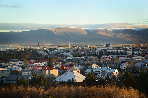 An aerial view of the village and mountains in Iceland