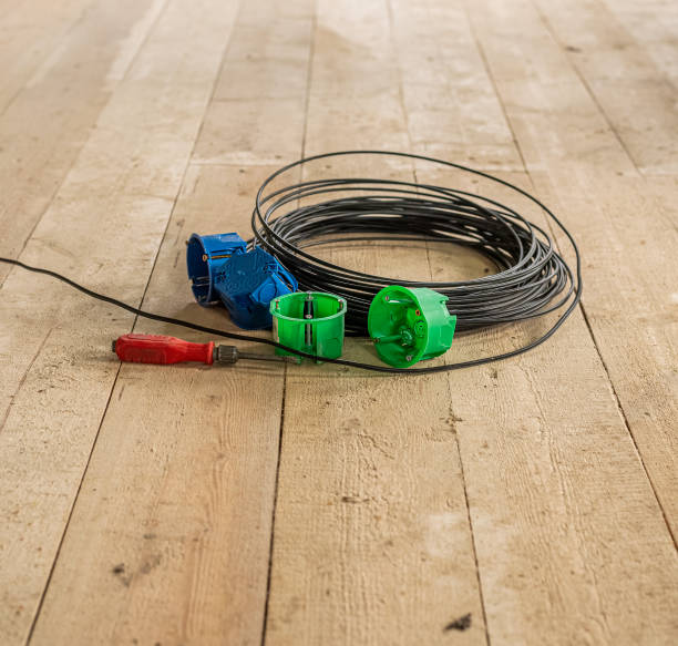 istock multicolored block boxes for sockets with a screwdriver on a wooden background. installation of electrical outlets in a wooden house 1436177117