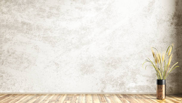 istock Empty interior background of room with gray stucco or concrete wall. Decorative copper vase with grass. 3d rendering 1436178645