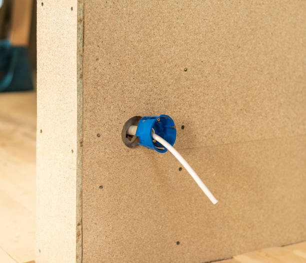 istock a block box for sockets with a screwdriver installed in the wall of a frame house. installation of electrical outlets in a wooden house 1436178693