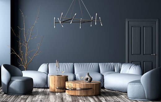 Modern interior design of apartment, living room with light blue sofa over dark blue wall, wooden coffee tables and leather armchairs. 3d rendering