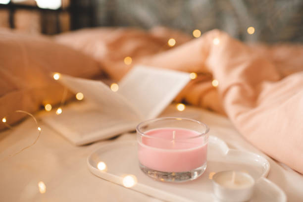 istock Hygge home atmosphere with scented candle 1436184970