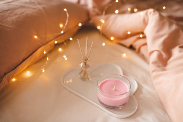 istock Hygge home atmosphere with scented candle 1436185019