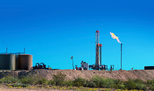 Drilling Rig Platform with flame in Carlsbad, New Mexico - USA