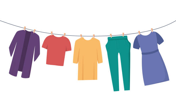 Clothes on clothesline. Clothes and accessories after washing on a rope. T-shirt, dress, trousers, blouse. Flat vector illustration for housekeeping, cleanliness concept. Clothes on clothesline. Clothes and accessories after washing on a rope. T-shirt, dress, trousers, blouse. Flat vector illustration for housekeeping, cleanliness concept cartoon of the clothes line stock illustrations