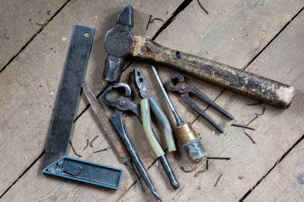 istock old tools on wooden boards with slits 1436187309