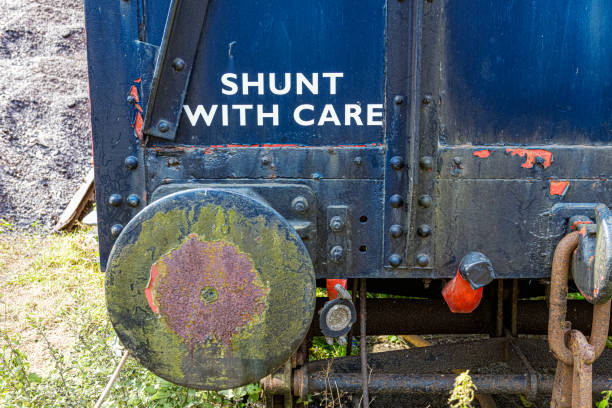 Close up of a railroad buffer stop on an old, obsolete, rusty, disused railway carriage