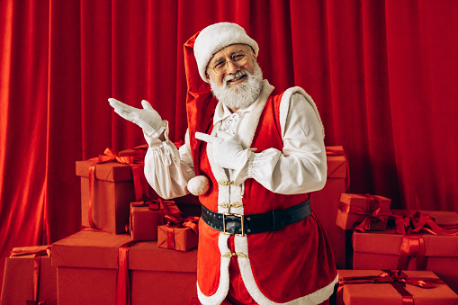 Cute Christmas gift with a mustache wearing a Santa hat