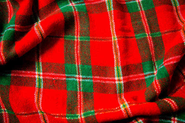 istock LV Red and green Christmas Holiday table cloth for background. 1436192117