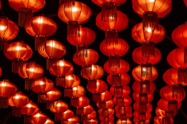 istock Beautiful shot of illuminated red traditional lanterns hanging from a ceiling 1436192156