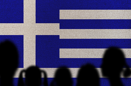 Family with Greek Flag.