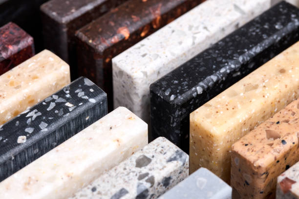 istock Porcelain stoneware square samples laid on kitchen countertop as examples of future kitchen fasade exterior. Samples slabs of natural granite marble quartz for stone countertops close up diagonal. 1436198650
