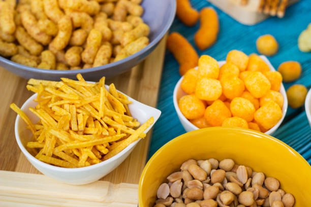 istock Beer salty snacks on wooden table 1436202194