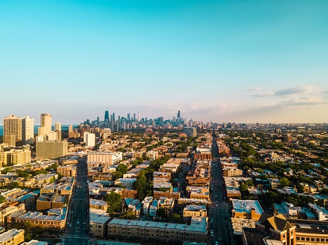 An aerial view of the buildings of Chicago in the evening