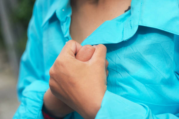 istock Thai Woman Holding own Hand 1436208140