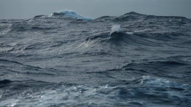 Rough sea and waves of the ocean from a boat