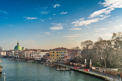 Landscape of the canals of Venice as an idyllic place for love and in the concept of a vacation spot for everyone over time.