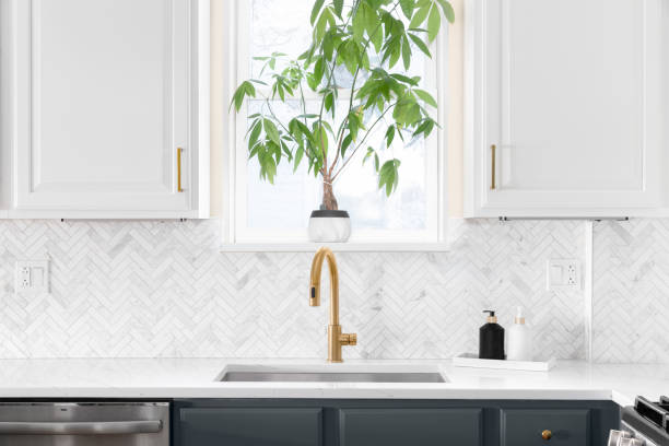 istock A gold kitchen sink detail shot in a beautiful kitchen. 1436216732