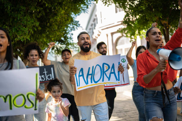 istock Protesters holding signs during on a demonstration outdoors 1436219195