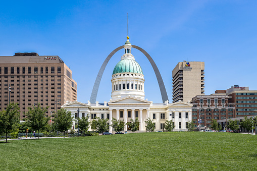 The Gateway Arch National Park at the base of the famous Gateway to the West with the city of St. Louis beyond.