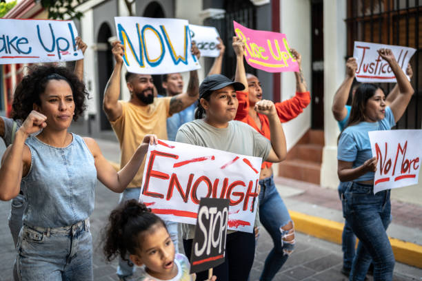 istock Protester holding signs on the protest outdoors 1436221824