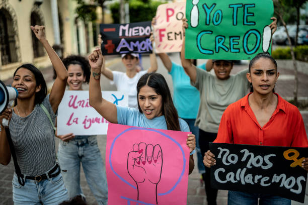istock Protesters women holding signs during a demonstration 1436227460