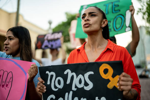istock Protesters women holding signs during a demonstration 1436227555