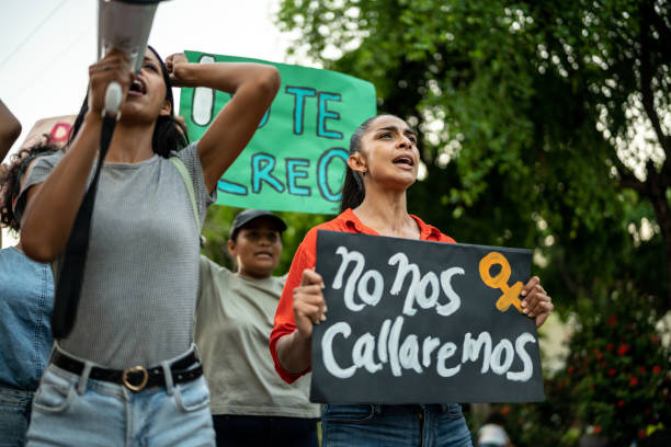 istock Protesters women holding signs during a demonstration 1436227827
