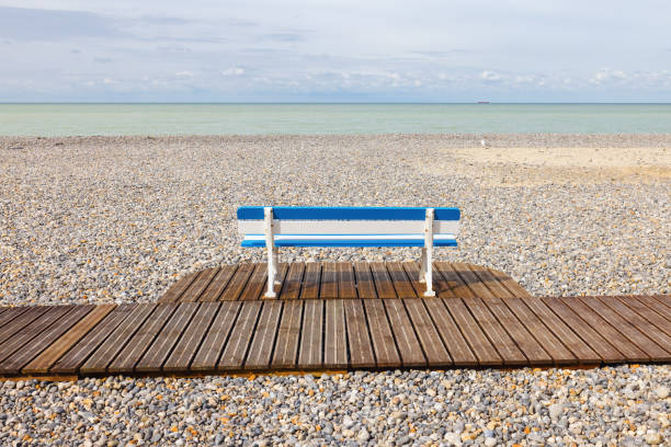 bench at the pebble beach of Mers-les-Bains, Seine-Maritime, France