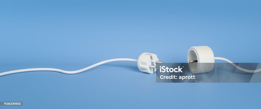Blackout or disruption concept: Separated Plug and Socket in whitelying on a blue background Blackout or disruption concept: Separated Plug and Socket in white
lying on a blue background Separation Stock Photo