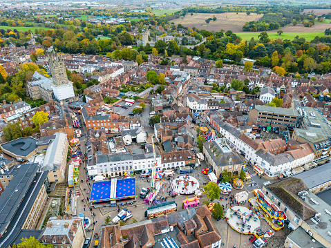 Warwick, UK 22 October 2022. Fun fair rides fill the town centre as part of the Warwick Mop Fair.