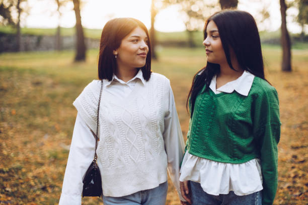 istock Two sisters spending quality time in the park 1436232057