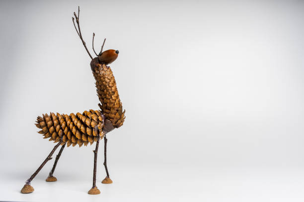 hand-made reindeer figurine with hornss, a children's craft made stock photo