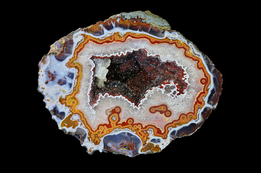 Quartz geode in eyelet-type agate with beautifully shaped calcite and goethite crystals. Origin: Morocco, High Atlas area around Aquim