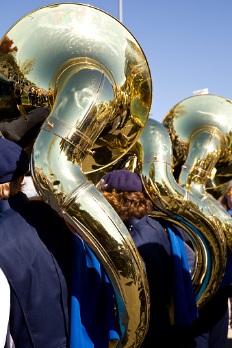 Marching band performance Group at college football game.