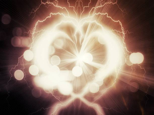 istock 3d illustration of heart shaped light shining in the dark 1436247613