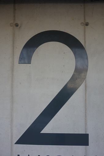 symbol of the number two or second, an arabic numeral