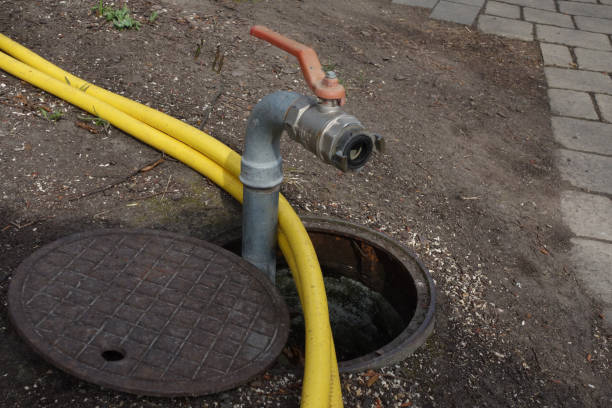 istock garden hose for watering in a garden 1436250470
