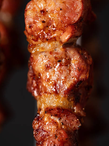 istock Cooking pork kebab in electrical barbecue on skewers 1436250853