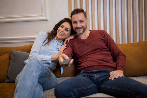 istock Senior couple watching TV 1436253896