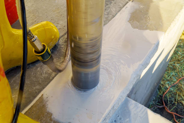 istock A hole is being drilled into concrete using a drilling machine that is used in the construction industry 1436257004
