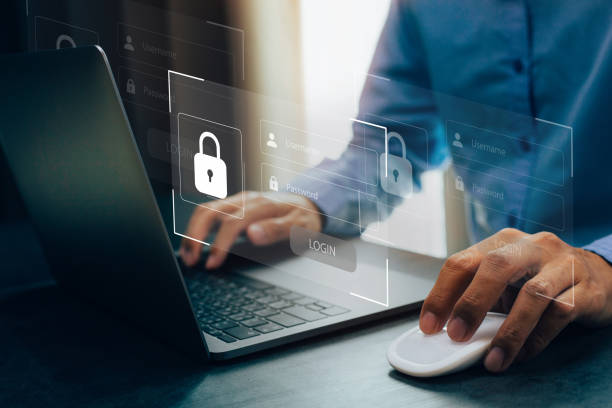 istock Businessmen protecting personal data on laptop and virtual interfaces. 1436262847